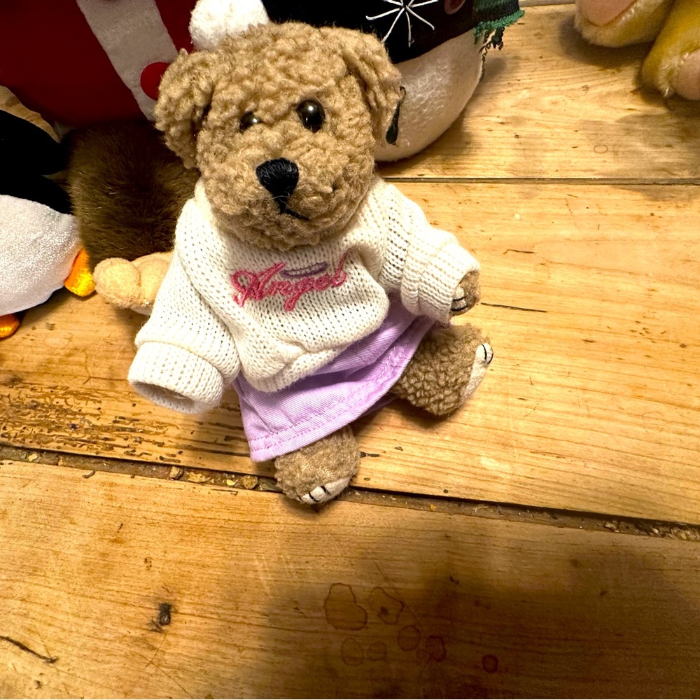 Stuffed bear with angel sweater